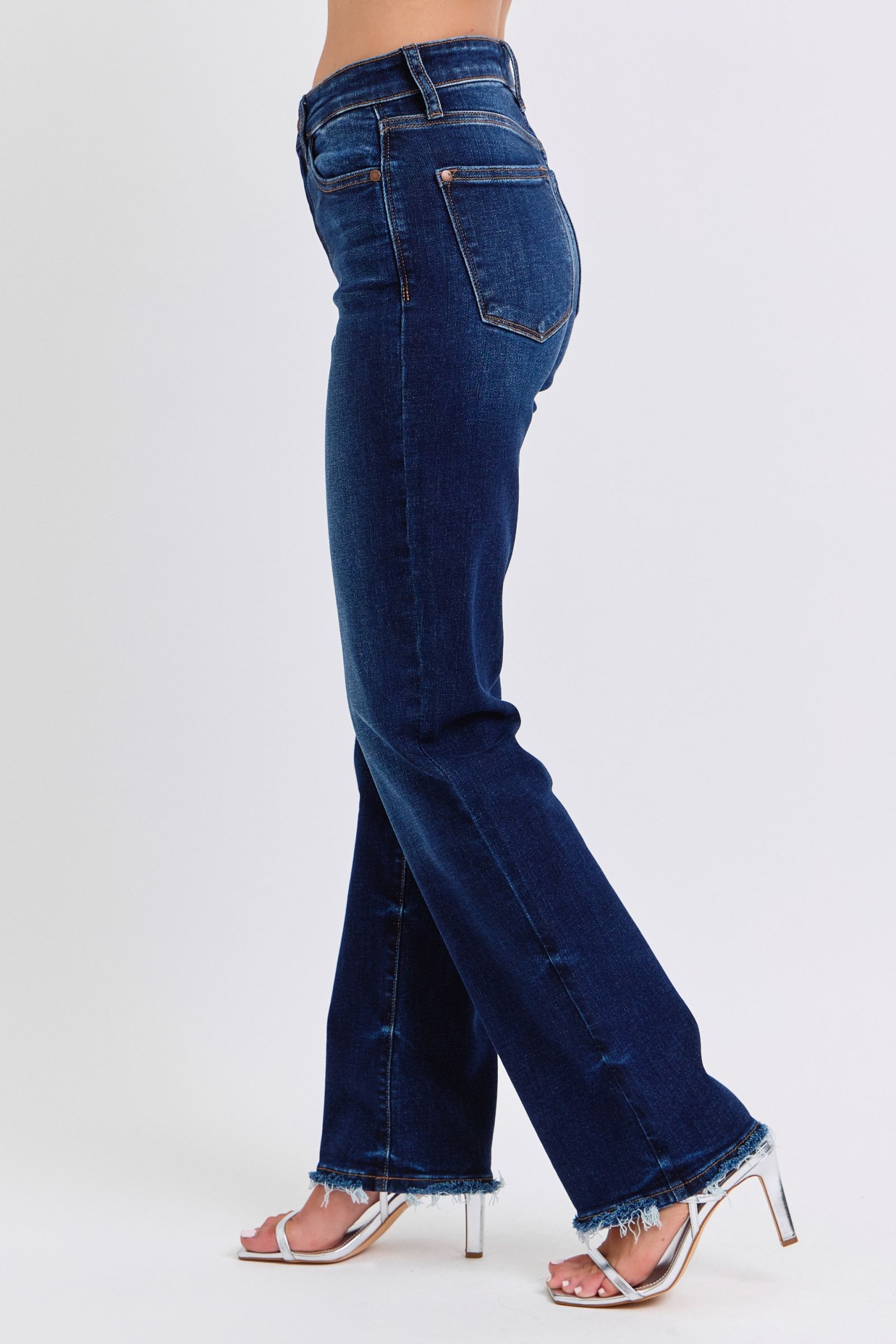 Judy Blue raw hem straight leg jeans with a versatile and flattering silhouette, perfect for casual or dressy occasions.