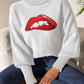 Bella Road Lip Turtleneck Long Sleeve Sweater in white with bold lips graphic, showcasing trendy and quirky style.