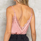 Woman wearing a pink Adjustable Strap Lace Trim Cami with delicate lace detailing on the back.