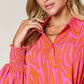 DOUBLE TAKE Full Size Printed Smocked Long Sleeve Blouse at Bella Road