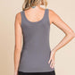 Back view of woman wearing Ribbed Scoop Neck Tank in gray, showcasing the sleek and slimming silhouette of the ribbed fabric