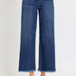 High Rise Raw Hem Cropped Wide Leg Risen Jeans with trendy unfinished edges and a chic wide leg silhouette, styled with sandals.