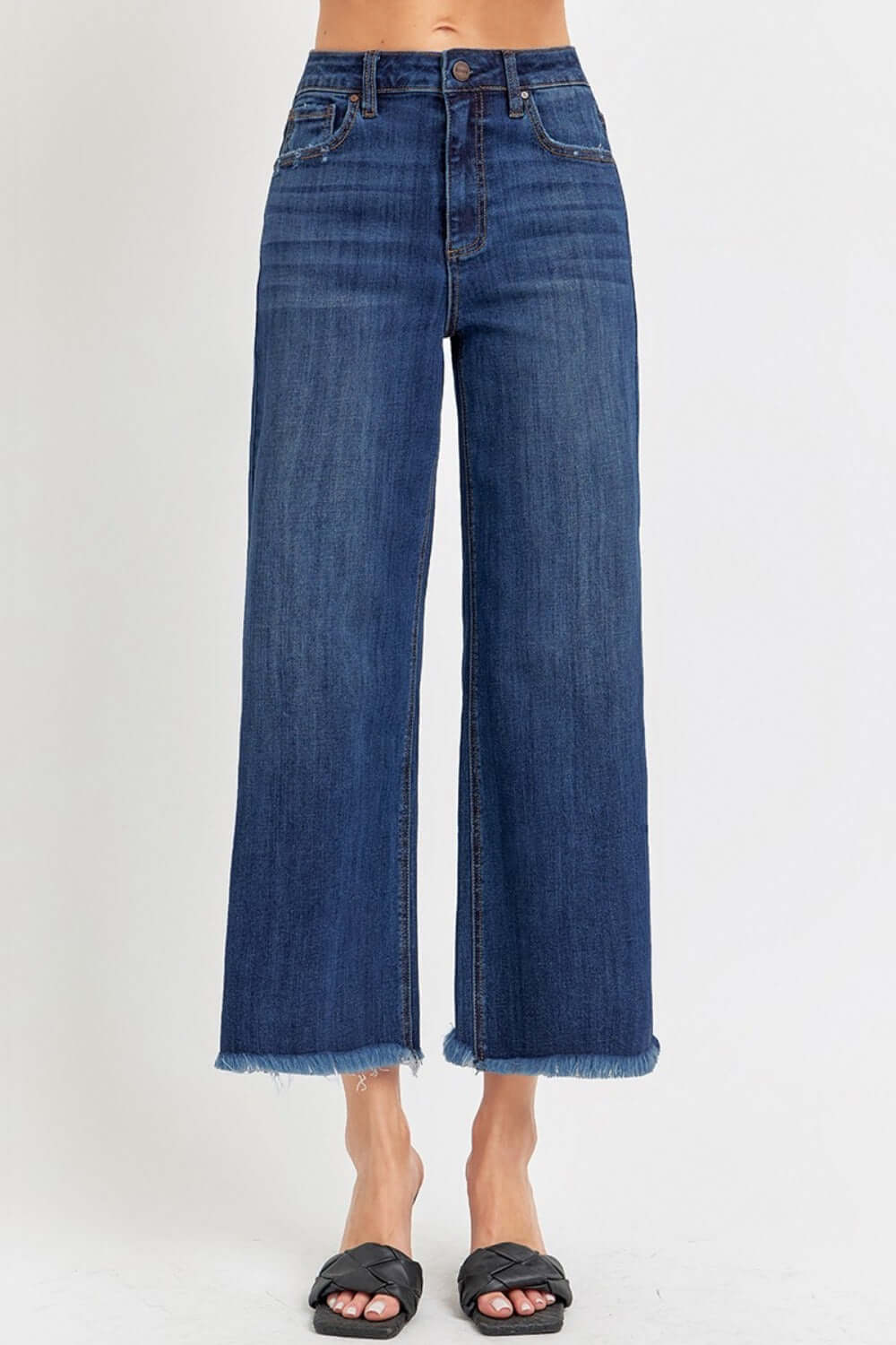 High Rise Raw Hem Cropped Wide Leg Risen Jeans with trendy unfinished edges and a chic wide leg silhouette, styled with sandals.