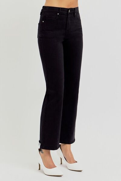 High-rise crop straight jeans with tummy control and elastic band, styled with chic white heels.