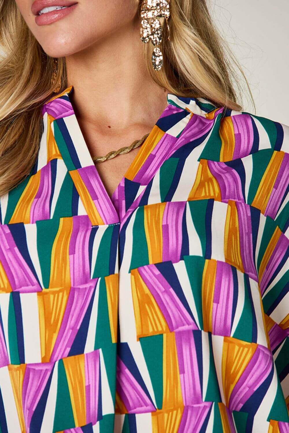 DOUBLE TAKE Full Size Geometric Notched Raglan Sleeve Blouse at Bella Road