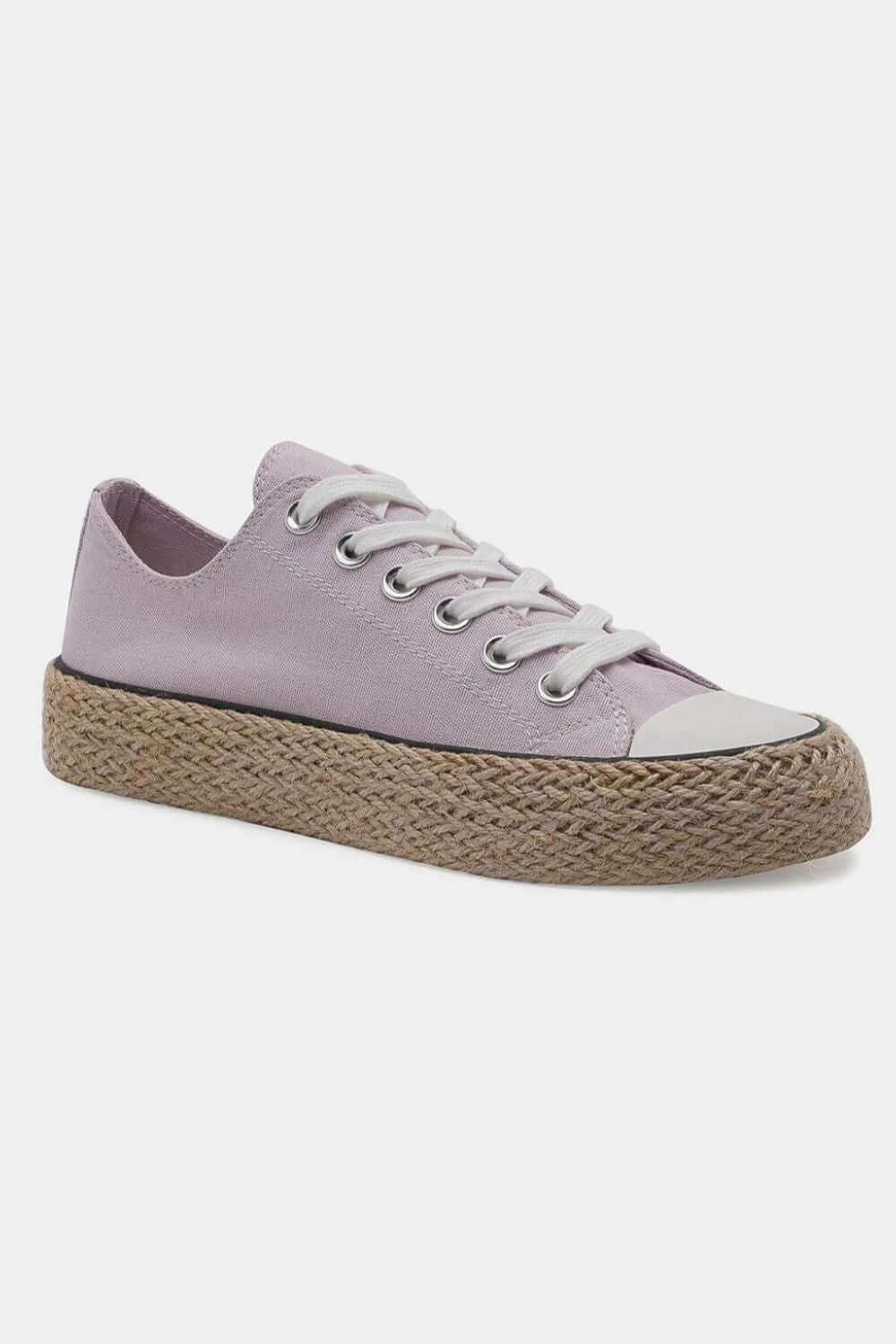 Stylish lavender lace-up sneakers with woven espadrille sole, perfect for summer outings and casual chic looks.