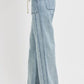 RISEN plus size straight leg jeans with pockets in light wash, showcasing a stylish and comfortable fit.