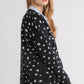 Stylish Umgee polka dot open front drop shoulder cardigan in black, perfect for layering and all-day comfort.