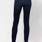 Back view of high waist hand sand skinny jeans by Judy Blue Jeans, showcasing flattering fit and sleek skinny design