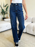 Woman wearing High Waist Straight Cargo Jeans with cargo pockets, featuring a flattering fit made from durable denim fabric by Judy Blue Jeans