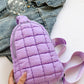 Lavender quilted nylon crossbody bag on denim jacket – stylish, lightweight, and perfect for adventures.