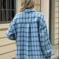 Woman wearing Bella Road Plaid Collared Neck Long Sleeve Jacket outdoors.