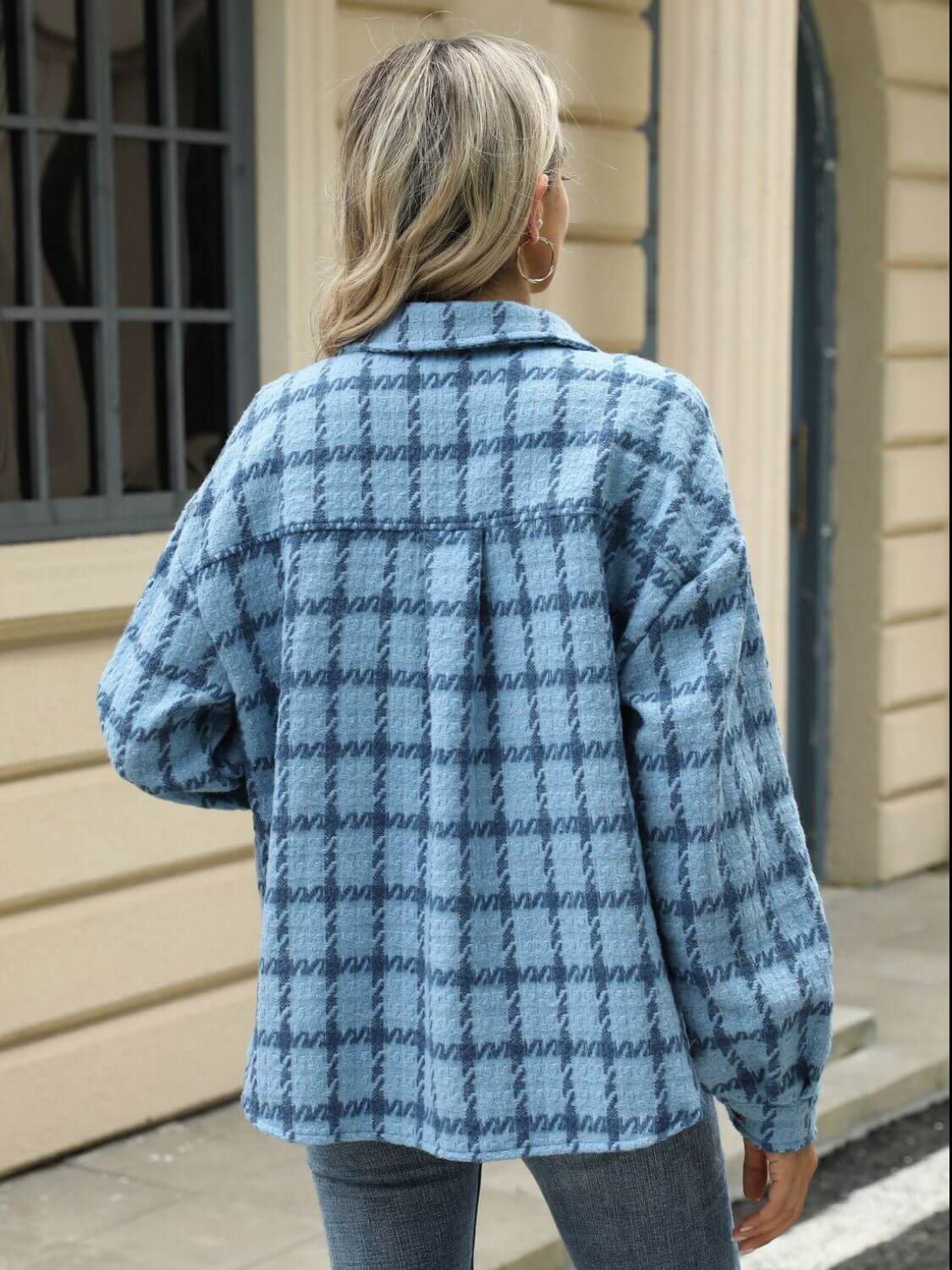 Woman wearing Bella Road Plaid Collared Neck Long Sleeve Jacket outdoors.