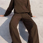 Trendy chocolate Bella Road set with round neck top and elastic waist pants for stylish comfort. Perfect for any occasion!