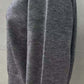 Side view of a cozy gray Bella Road Button Down Long Sleeve Cardigan, showcasing its soft texture and comfortable fit.