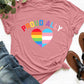 Pink round neck short sleeve t-shirt with "Proud Ally" text and rainbow heart design, displayed with jeans and sandals.