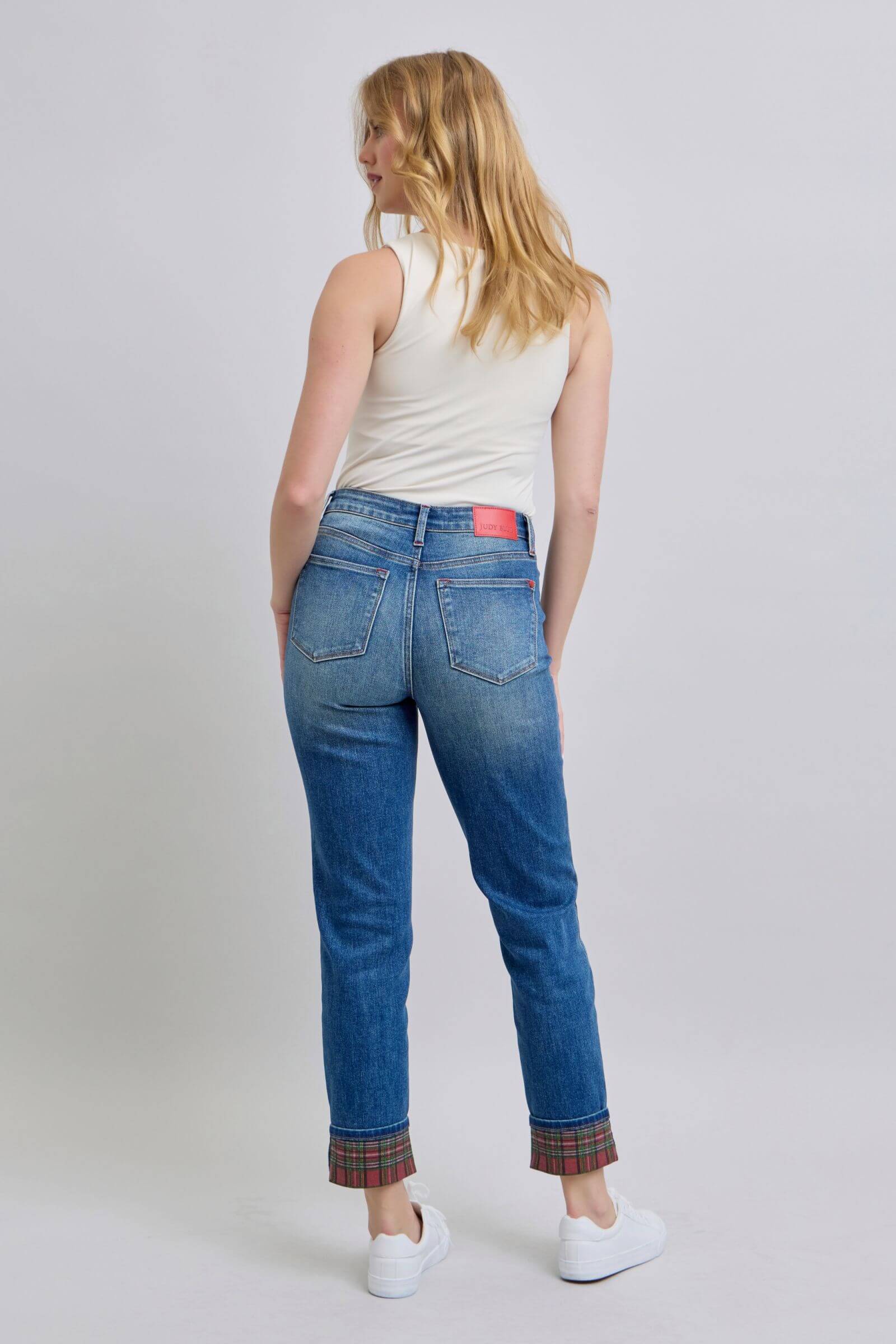 Back view of Judy Blue plaid cuff straight leg jeans, showcasing mid waist style and functional pockets for a trendy look.