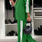 Stylish woman in green contrast lapel collar top and pants set, showcasing a chic two-piece outfit with a modern vibe.