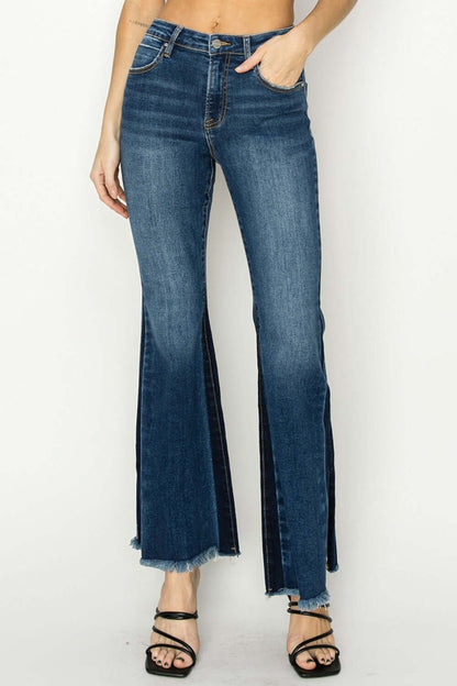 High rise side shadow seam detail slit flare jeans by Risen Jeans on model with trendy flared leg design and stylish slit details.