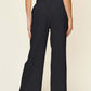 DOUBLE TAKE Full Size Texture Smocked Waist Wide Leg Pants at Bella Road