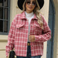 Woman wearing Bella Road Plaid Collared Neck Long Sleeve Jacket in pink, paired with jeans, a white knit sweater, sunglasses, and a black hat.