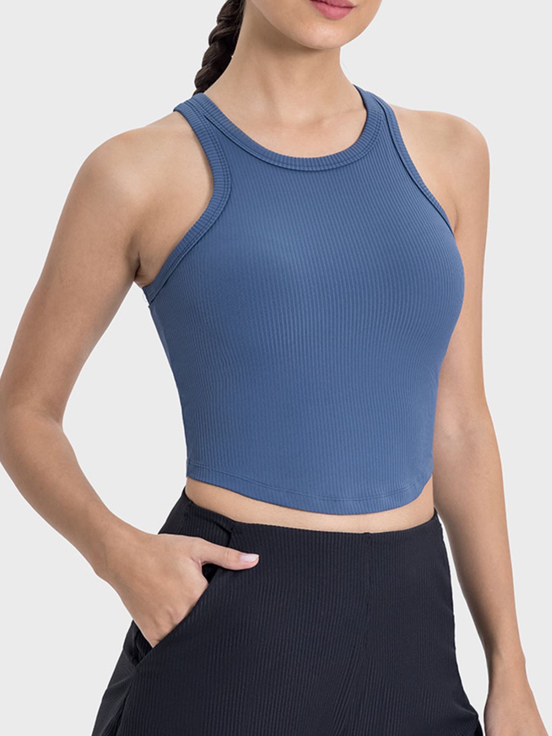 Millennia blue round neck racerback active tank, perfect for workouts with moderate stretch and a sleek fit.