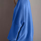 Double Take Side Slit Round Neck Long Sleeve Sweater in blue with a playful side slit design for a cozy and fun look.