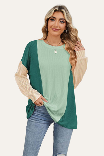 Trendy round neck long sleeve t-shirt with texture contrast in green and beige, perfect for stylish layering.