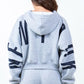 Back view of American Bazi 'New York' graphic cropped hoodie with drawstrings, showcasing its trendy design.