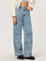 Model showcasing Bella Road Denim Wide Leg Jeans in light wash, featuring pockets and a trendy oversized fit.