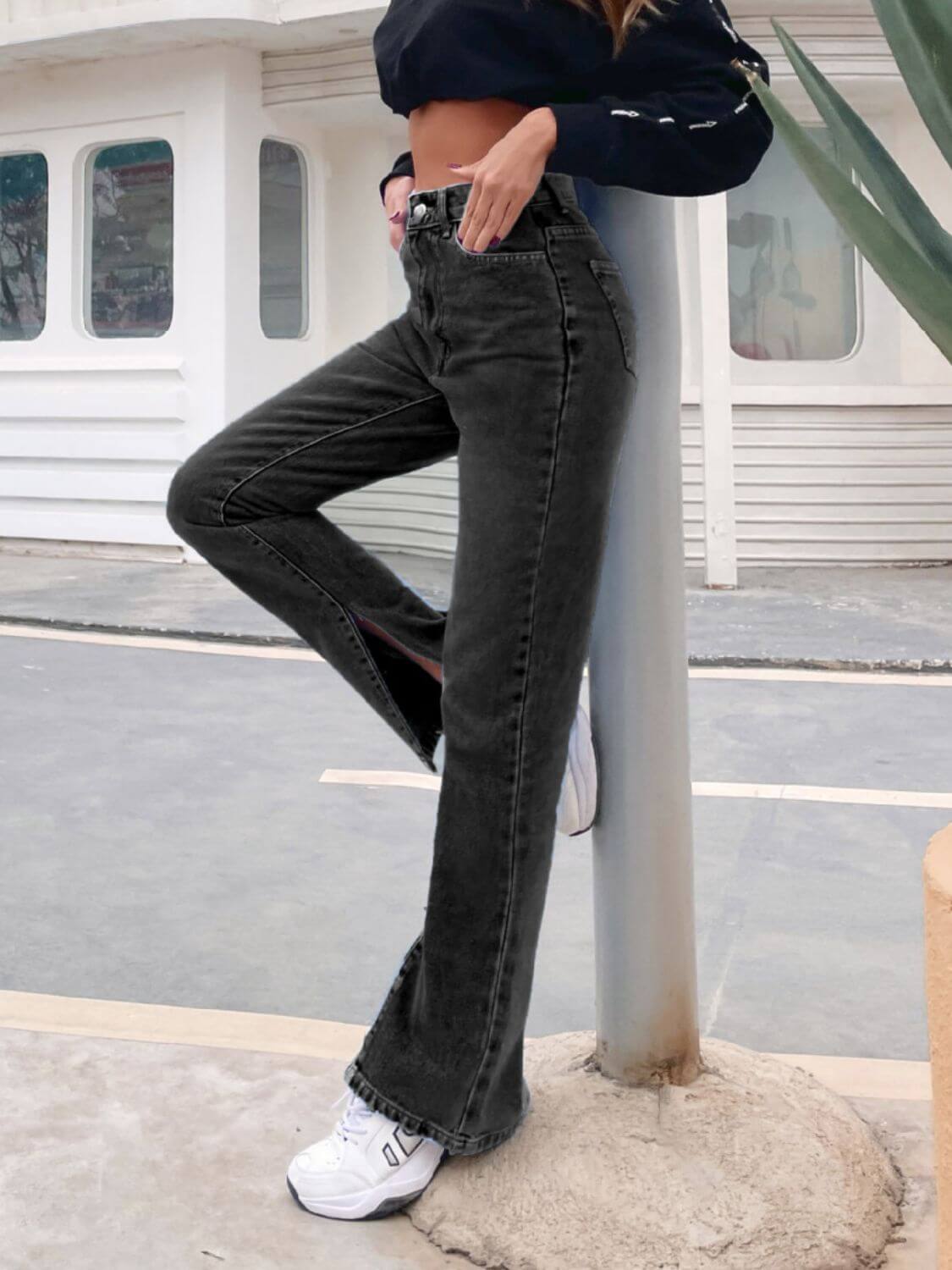 Bella Road Side Slit High Waist Jeans with Pockets – High-waist black denim jeans featuring side slits and functional pockets, perfect for stylish wear.