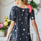 HEIMISH Full Size Star Print Asymmetrical Neck Short Sleeve Top at Bella Road