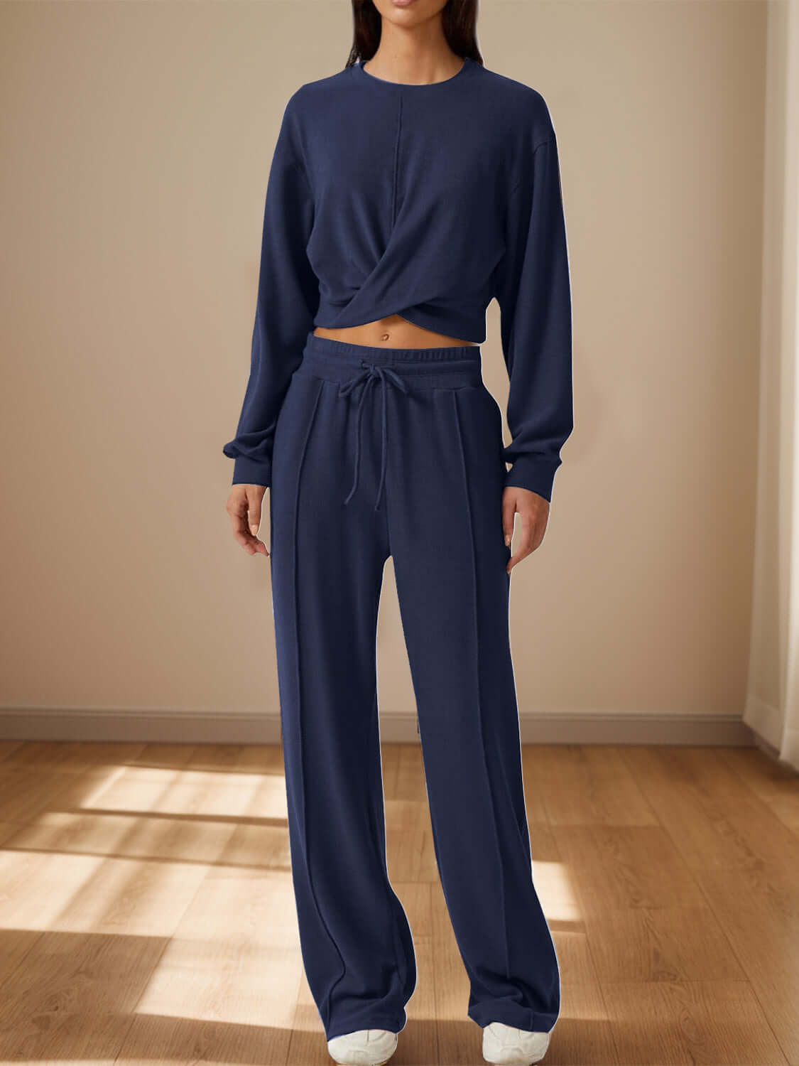 Bella Road Crisscross Round Neck Top and Drawstring Pants Set in navy blue, perfect for casual outings and date nights.