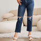 Woman wearing Crop Dylan Full Size Tummy Control Distressed High Waist Raw Hem RFM Jeans