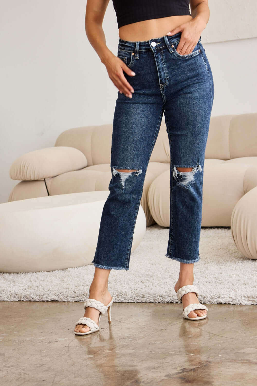 Woman wearing Crop Dylan Full Size Tummy Control Distressed High Waist Raw Hem RFM Jeans