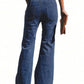 Woman wearing tied flare jeans with back pockets, featuring a comfortable stretch fit. Perfect for stylish and standout fashion.