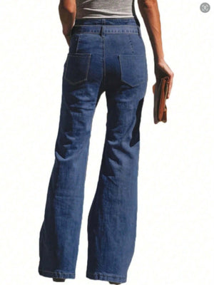 Woman wearing tied flare jeans with back pockets, featuring a comfortable stretch fit. Perfect for stylish and standout fashion.