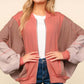 Trendy color block bomber jacket with zip-up front and side pockets, perfect for layering over casual outfits.