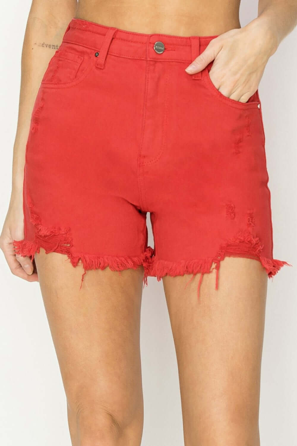 High Rise Distressed Red Denim Shorts by Risen Jeans with frayed hems for a stylish and edgy look.