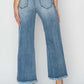 High-rise, raw hem, cropped wide leg jeans from Risen Jeans, back view showing trendy stylish design and frayed hem detail.