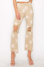 High rise star printed frayed hem jeans with trendy design, showcasing a fun and fashionable look perfect for any occasion.