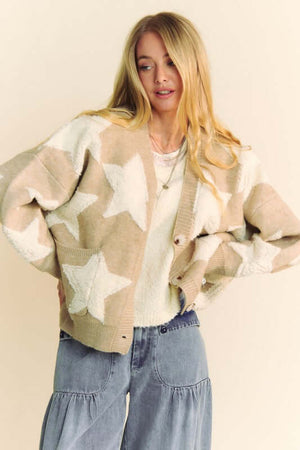 Stylish model in Davi & Dani Fuzzy Star Button Down Cardigan with playful star embellishments and cozy texture.