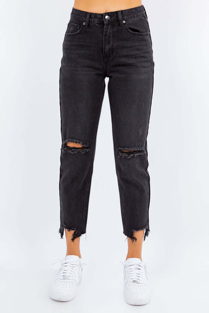 High Waist Distressed Cropped Straight Jeans with edgy ripped knees and modern silhouette modeled with white sneakers.