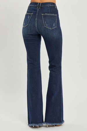 Back view of high waist raw hem flare jeans showcasing trendy fit and raw hem detailing for a retro-inspired look.