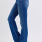 Judy Blue mid-rise bootcut jeans with thermal lining, featuring a flattering silhouette and slight flare at the hem.