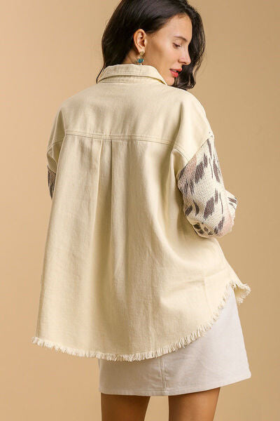 Back view of Umgee Plus Size Distressed Button Up Jacket showcasing raw hem and trendy animal print sleeves.