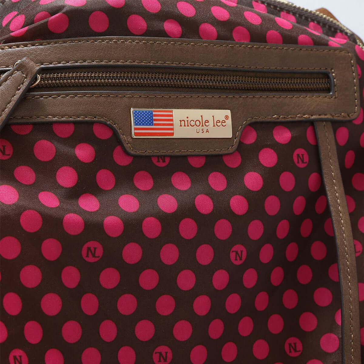 Nicole Lee USA Boston Bag interior with pink polka dot pattern and brown zipper detailing