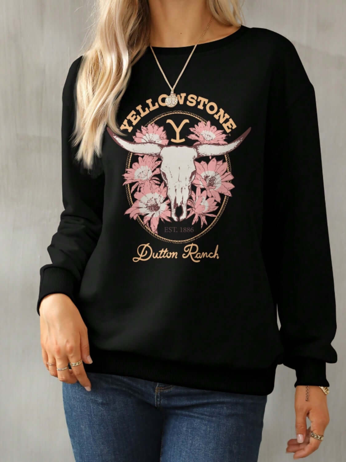 Cozy Bella Road Yellowstone Round Neck Sweatshirt with floral and nature design, perfect for cool weather comfort and style.