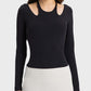 Millennia Halter Neck Long Sleeve Sporty Top in black, stylish and stretchy for a trendy workout look.