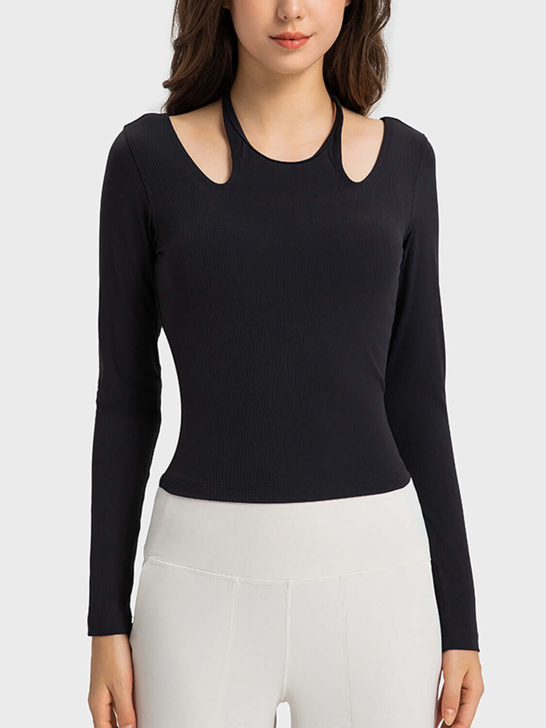 Millennia Halter Neck Long Sleeve Sporty Top in black, stylish and stretchy for a trendy workout look.